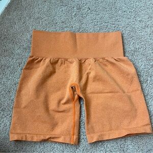 NVGTN Orange Pro Seamless Shorts